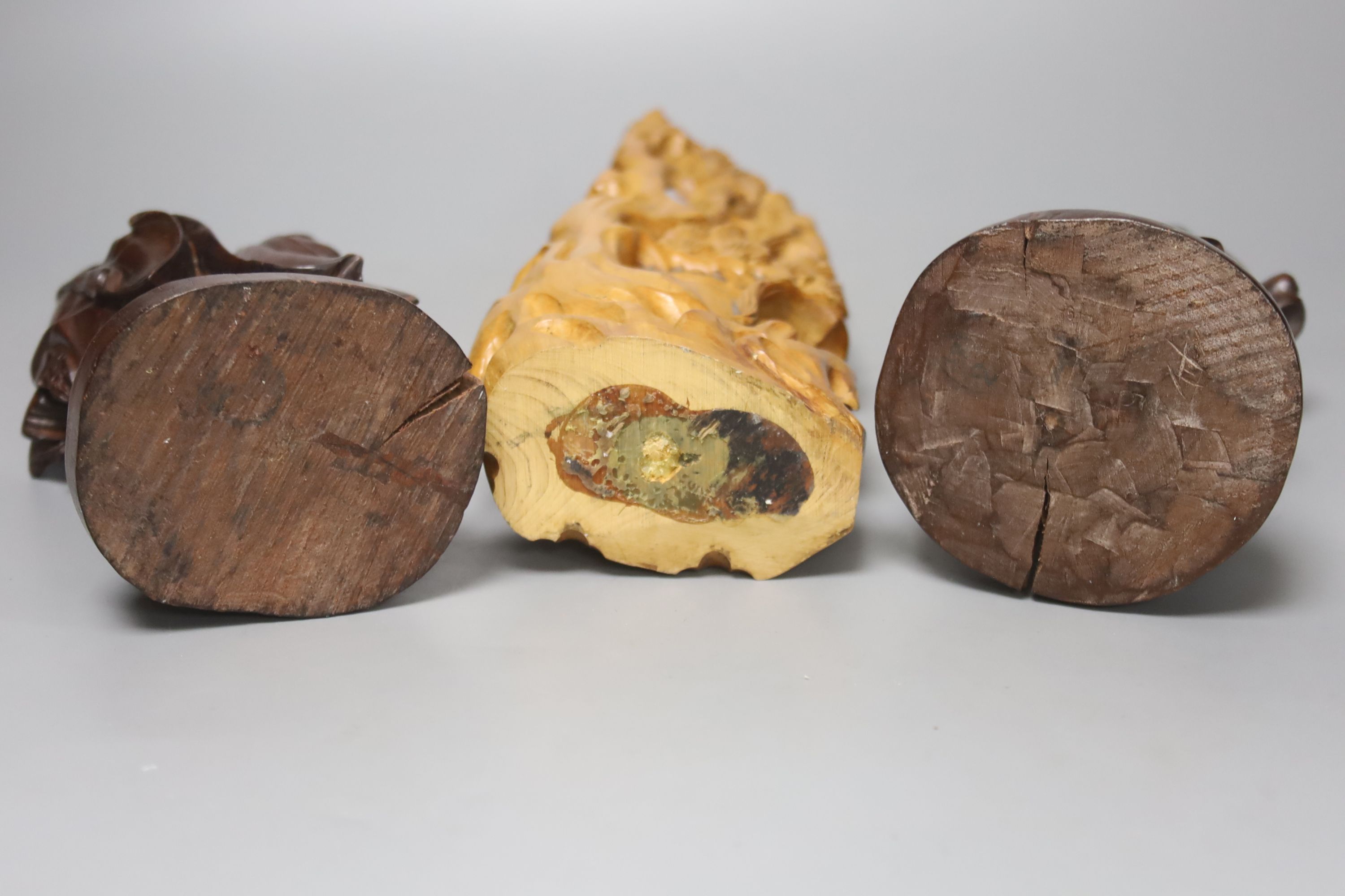 A collection of Chinese and Japanese wooden carvings to include an erotic netsuke (7)